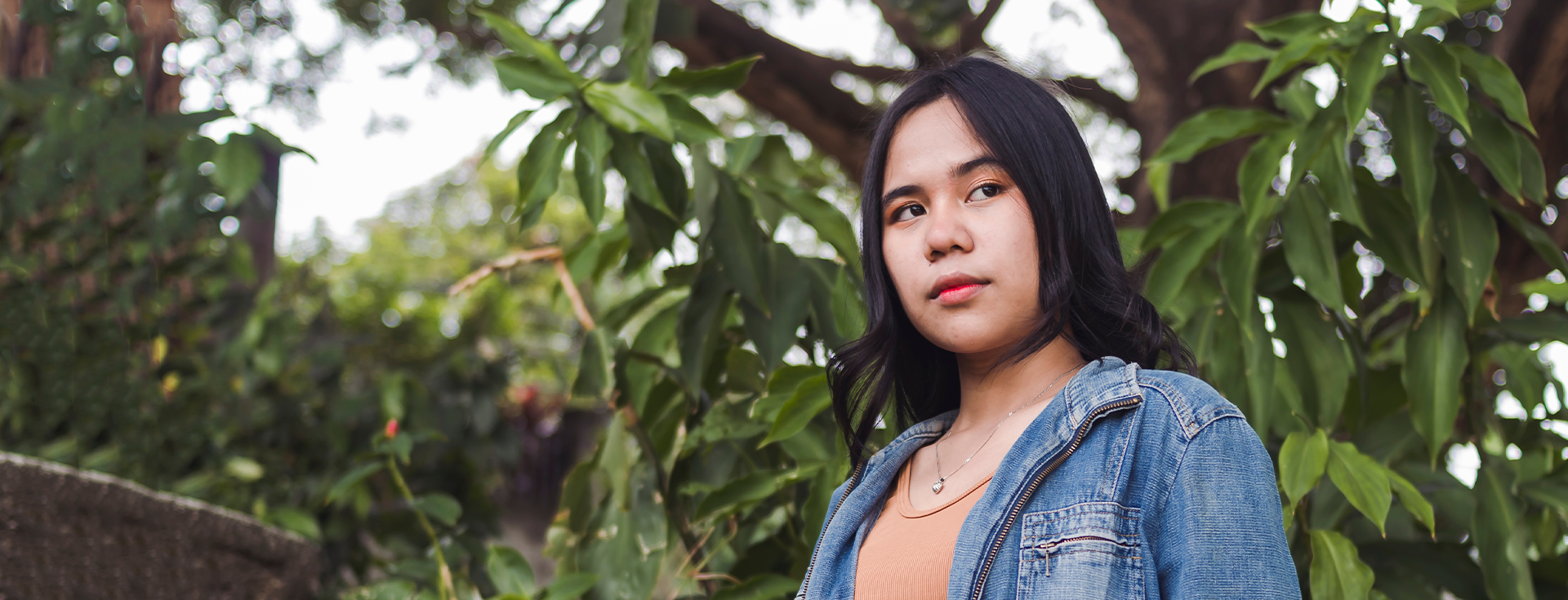 A woman contemplating the potential risks associated with taking the abortion pill